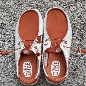 Hey Dude Woman's Slip-On Loafers in Rust and White with the Texas Longhorn logo